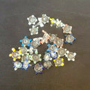 A pack of Random Color Glass Filters on a table